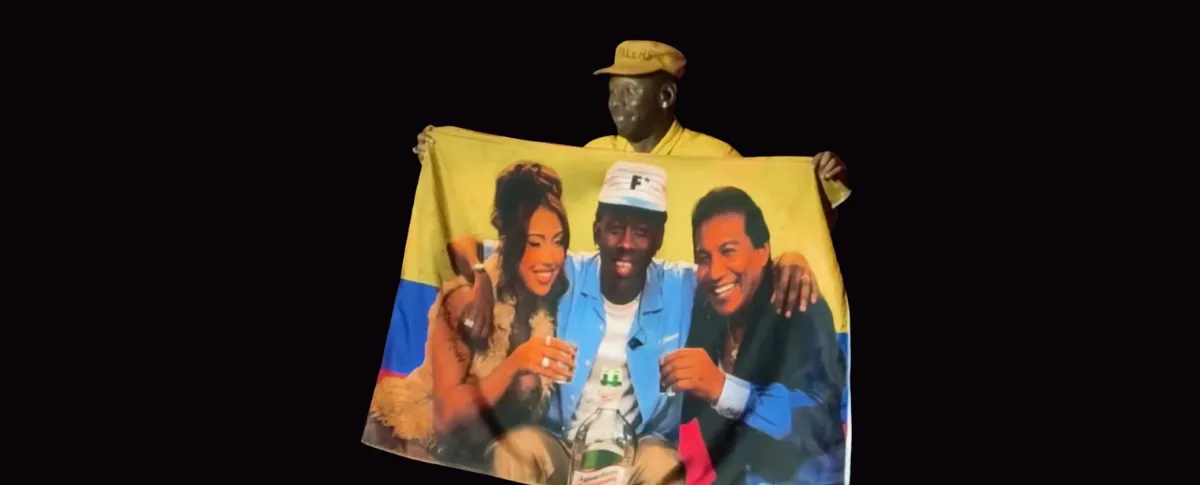 Tyler, The Creator con la bandera de Diomedes Diaz.